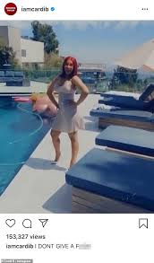 Cardi B Jumps Into Pool Fully Clothed In Display Of Carefree Attitude After Debunking Fake Account Daily Mail Online We said go for it.