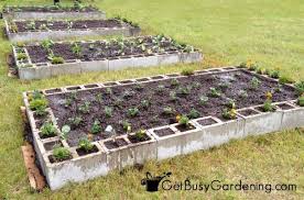 Fill the bed with a 50/50 mix of planting soil and compost. How To Make A Raised Garden Bed Using Concrete Blocks Step By Step