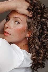 We Have Curly Hair Here Are The 23 Holy Grail Products We Swear By For Styling Curly Hair Styles Curly Styling Types Of Curls