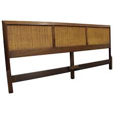 Bed frame includes wooden slats and natural wood finish legs. Mid Century Modern John Stuart Style Walnut Caned King Size Headboard For Sale At 1stdibs