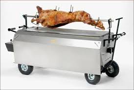 Raven in a spit roaster (guro). Titan Hog Roast Machine Hog Roast Co Spittingpig Co Uk