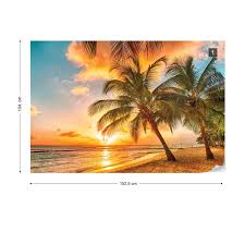 Palm trees and sky beautiful composition that includes the top of many palm trees and gorgeous blue sky. Tropical Beach Sunset Palm Trees Wall Paper Mural Buy At Europosters