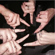Color stay true words tattoo on fingers for men. The Best Small Tattoos You Ll Want To Copy From Celebrities Glamour