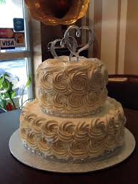 The Silver Bling Really Makes This Simple 2 Tier Rosette Cake Go To The Next Level 2 Tier Wedding Cakes Wedding Cakes Silver Wedding Cake