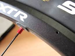 The mechanic said it's ok if the hub has the 36 holes on a 32 hole rim rather than the other way around cause it's impossible to be aligned. Hole Drilled In My New Rim Mountain Bike Reviews Forum