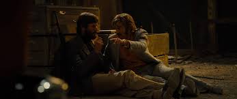 Martin is shot in the head, with his brains leaking out, but rouses himself to. Free Fire Filmgrab