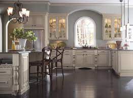 Schrock S Newest Grey Stone Glaze Shown On Coconut Adds Cool Sophistication To Th Kitchen Design Styles Cream Kitchen Cabinets Cream Colored Kitchen Cabinets