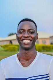 Smiling Man in White Crew Neck Shirt · Free Stock Photo