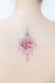 Beautiful Pink Lotus Tattoo Flower Back Tattoo Geometrictattoo A Colorful Beautiful Pink Lotus Tattoo F In 2020 Pink Lotus Tattoo Tattoos Flower Tattoo Back
