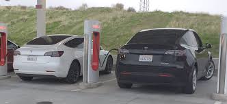Tesla Model Y Spotted Supercharging Side By Side With A Model 3 Tesla Tesla Model Tesla Roadster