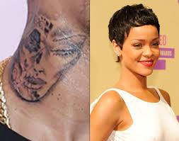 In august 2010, rihanna got a tattoo of the text rebelle fleur written in script on the left side of her neck. Is Chris Brown S Neck Tattoo Of Rihanna S Face Singer Shows Off Ink Of Brutally Beaten Woman But Denies It S His Ex New York Daily News