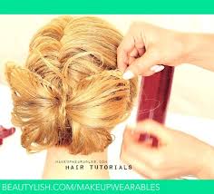 Braided hairstyles are the most feminine and elegant, but sometimes they're too difficult to implement at home. Butterfly Braid Bun Tutorial Video Cute Braided Hairstyles Tina Makeupwearables L S Makeupwearables Photo Beautylish