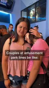 Couples in Line at Disneyland Amusement Park
