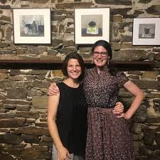 Artists Kristen Peyton and Lauren Kindle with Susan Jane Walp's pieces in  the chapel, photo by Kristen Peyton
