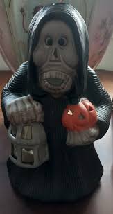 Whoever knew that the Grim Reaper could be cute. Found at a thriftstore in  Maryland for $1.99.