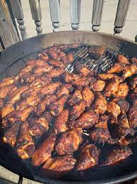 Grilled chicken wings are less messy to make than the classic fried version—not to mention delicious—so what's not to love? First Attempt Hickory Smoked Wings On Weber Kettle Smoking