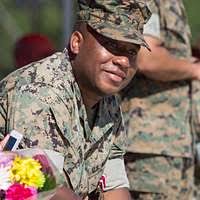 Petty Officer 2nd Class Adam Sumner receives sacramental