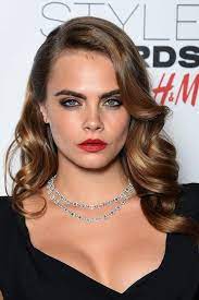 The Beauty Evolution Of Cara Delevingne From Model On The Rise To It Brit Icon Hair Waves Hollywood Hair Celebrity Long Hair