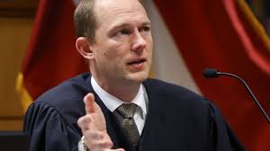 Judge for Georgia election case dismisses some charges against Trump