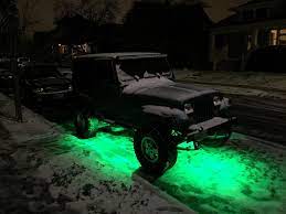 Rock Lights Jeep In Snow With Beautiful Green Led Lights Jeep Jeep Lights Jeep Led Lights