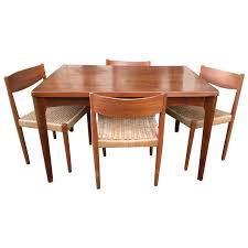 Free shipping on most dining room sets. Danish Modern Extendable Teak Dining Table With Woven Chairs At 1stdibs