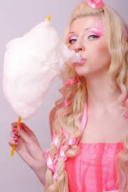 Woman with cotton candy stock image. Image of modern