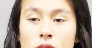 Woman charged with domestic assault