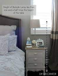 Your lamps should look large enough to handle the bed and nightstands. What Is The Right Bedside Lamp Height Diy Decorator Bedroom Side Table Lamps Bedside Lamp Bedside Lamps Diy