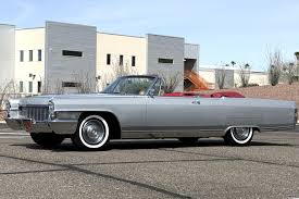 Image result for Starlight Silver 1965 Cadillac