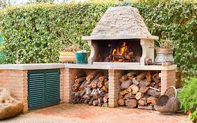 Wood And Stone Rustic Outdoor Kitchen With Firewood Oven Rustic Outdoor Kitchens Outdoor Kitchen Kits Outdoor Cooking Spaces