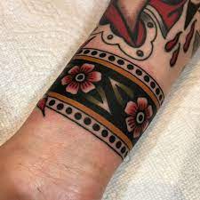 Traditional Cuff By Dannii G In Dallas Tx Traditionaltattoos Traditional Tattoo Flowers Traditional Tattoo Cuff Traditional Tattoo