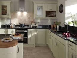 Sage green cabinets with black countertops. Sage Green And Black Kitchen Novocom Top