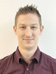 Adams named Eagle sports editor