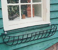 I left the basket the natural color in this case and added a little paint dip in coral. 24 Inch Euro Classic Hayrack Planter Basket Only No Liner Hayracks Kinsman Garden Company