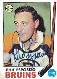 On this day in 1970, Phil Esposito gets the better of younger brother Tony  Esposito in Game 1 of the Semifinals. Phil, the NHL leader in goals during  the regular season, scores