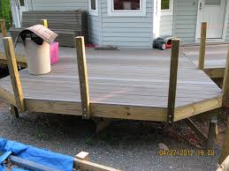 The previous 4x4 deck rail posts were notched and attached with nails on the outside of the deck. How To Attach 4x4 Post To Deck How To Add A Rail To A Pre Existing Deck
