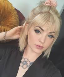 You can see that her platinum blond locks are boy cut and paired with a long side fringe that starts somewhere on the crown. Sweet And Stylish Half Up Blonde Hairstyles With Bangs For Women Blonde Hair With Bangs Hairstyles With Bangs Short Hair With Bangs