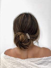 Elegant Chignon Low Bun Wedding Hairstyle Sincerely Jules Hair Accessories Upstyle Bun Hairstyles For Long Hair Loose Bun Hairstyles Bridesmaid Hair Chignon
