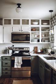 Just as empty open kitchen shelving will look a bit strange, so too will your shelves look strange if they are overloaded with items. 3 Ways To Make Your Builder Grade Cabinets Look Custom Hand Gathered Home