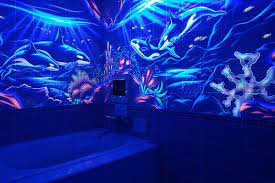 in out dark blue paint black light room light in the dark