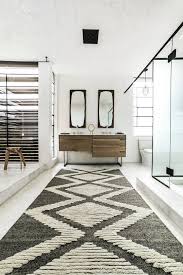 And also, may be made from a variety of materials. Southwestern Bathroom Rugs With Scandinavian Bathroom And Double Sinks Rug Runner Wall Mirrors Window Wall Wood Stool Finefurnished Com