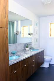 Complete the look with the lafleur solid color single shower curtain, eliason 60 double bathroom vanity set, and sorcha stool. A Mid Century Modern Inspired Bathroom Renovation Before After Dans Le Lakehouse