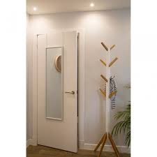 A mirror on your bedroom or closet door saves space and is a convenient way to check out your outfit. Over Door Mirror White Clanbay