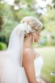 Bridal Updo With White Flowers Classic Wedding Hair Wedding Hairstyles Updo Best Wedding Hairstyles