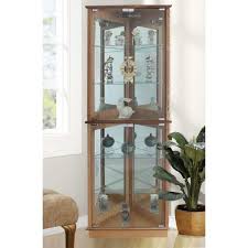 Show off your souvenirs, sculptures, china,show off your souvenirs, sculptures, china, photos and other classic pieces in timeless style, with this exquisite lighted corner curio cabinet. Floor Standing Oak 3 Sided Lighted Corner Curio Cabinet Fscc002 V 72mk The Home Depot