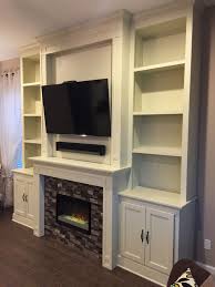 Custom Fireplace Electric Fireplace Tile Surround Built In Bookcases Tv Over Fireplace Fireplace Built Ins Custom Fireplace Fireplace Insert Installation