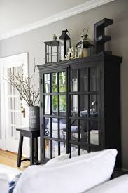 Thoughts On Decorating The Top Of An Armoire Black Living Room Home Decor Formal Living Rooms