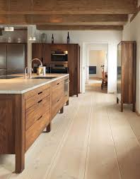 This example beautifully showcases how wood construction can completely transform a kitchen design from the ordinary to extravagant. Modern Wood Kitchen Cabinet Design Novocom Top