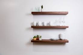 Floating shelf with metal railing casual style floating shelf made from manufactured wood topped off with laminate that protects its surface from scratching. Buy Hand Crafted Walnut Floating Shelves Espresso Floating Shelves Dark Wood Floating Shelves Black Walnut Shelf Made To Order From Brick Mill Craft Furniture Custommade Com