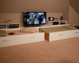 Loft Space Ideas Pull Our Guest Beds And Tv With Angled Ceilings Loft Spaces Attic Rooms Remodel Bedroom